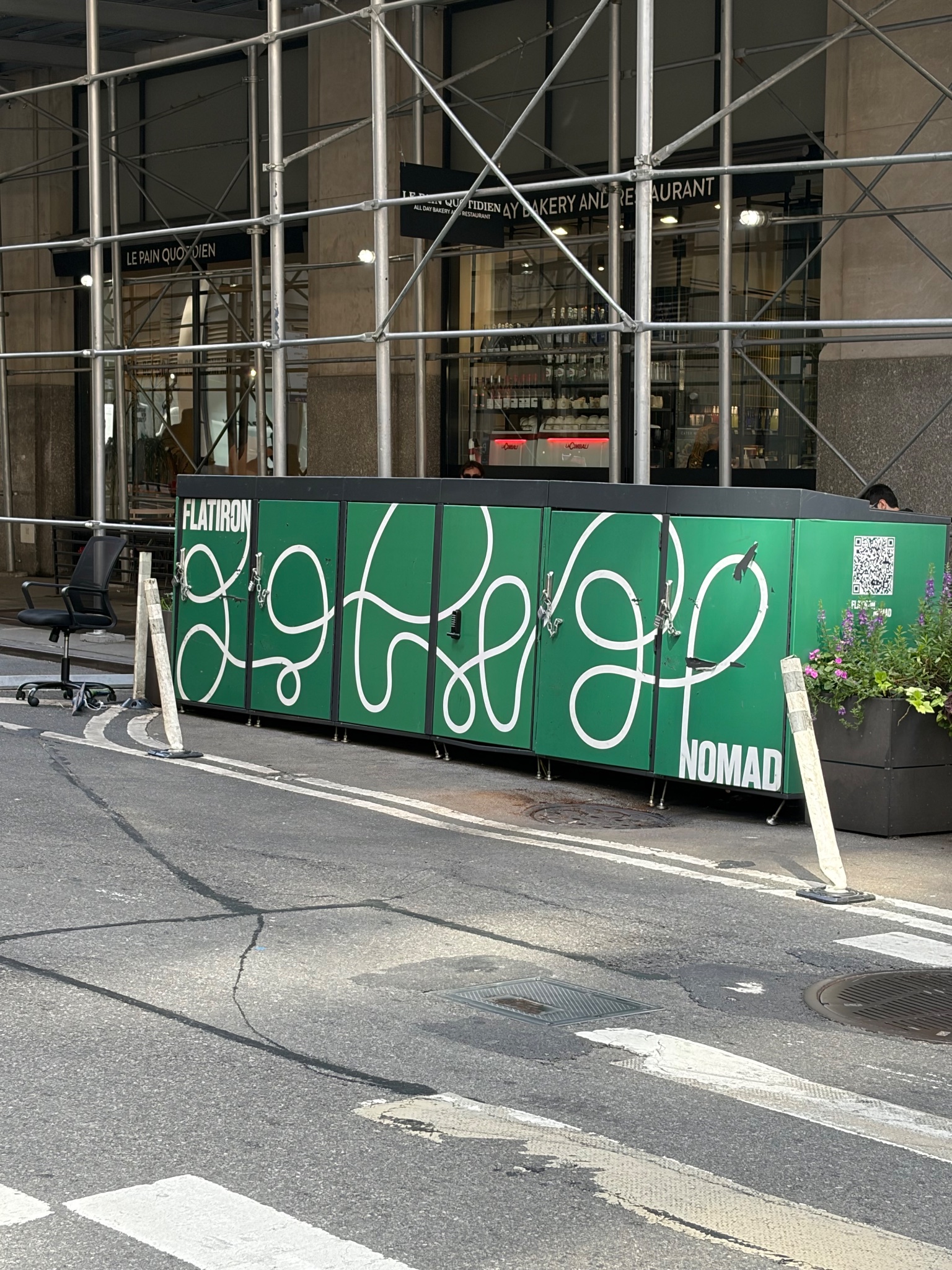 Looping white line on Flatiron NoMad bins