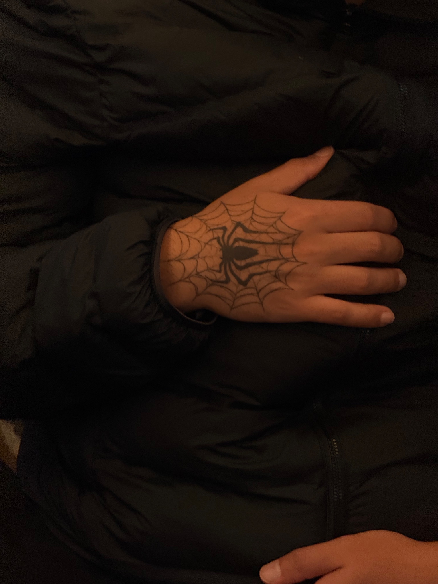Spider and web hand tattoo, 17th Arrondissement