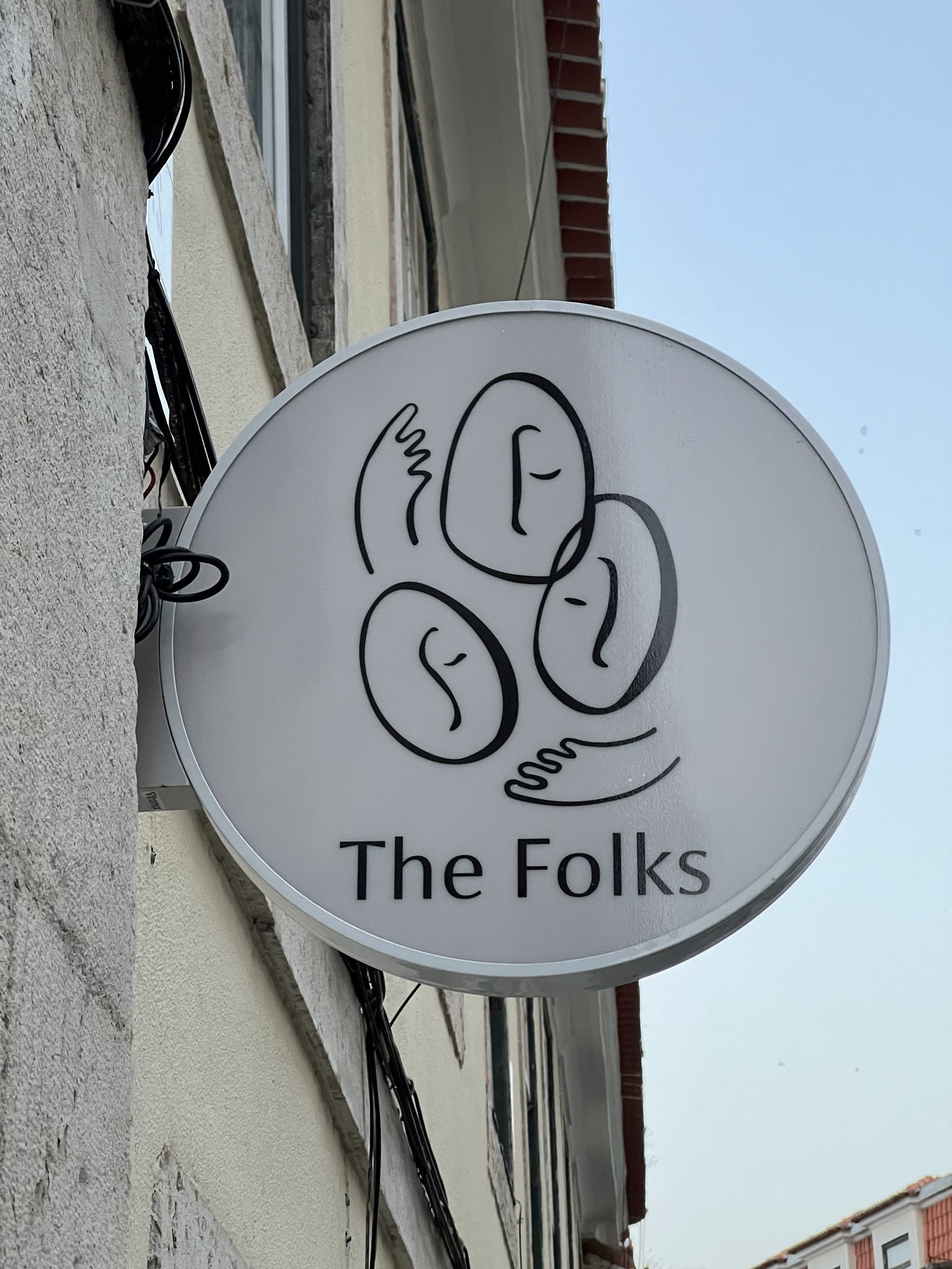 The Folks line-drawn faces logo, Lisbon